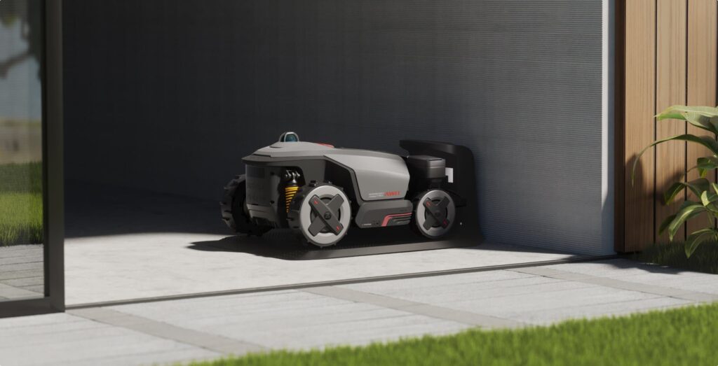 Roborock robotska kosilnica na polnilni postaji pred prvim zagonom