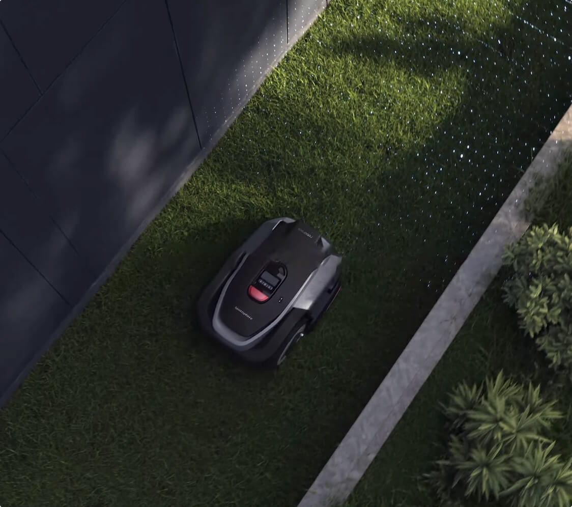 Roborock RockMow S1 gladko navigira skozi ozek vrtni prehod